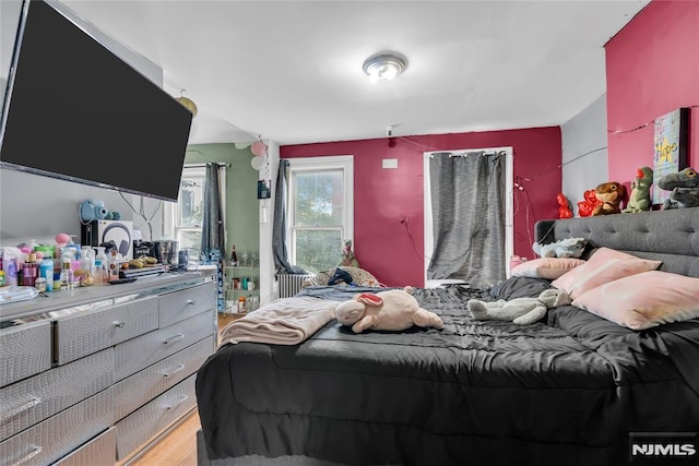 bedroom featuring light wood-type flooring