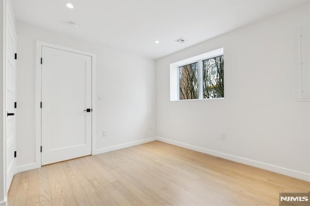 empty room featuring light hardwood / wood-style floors