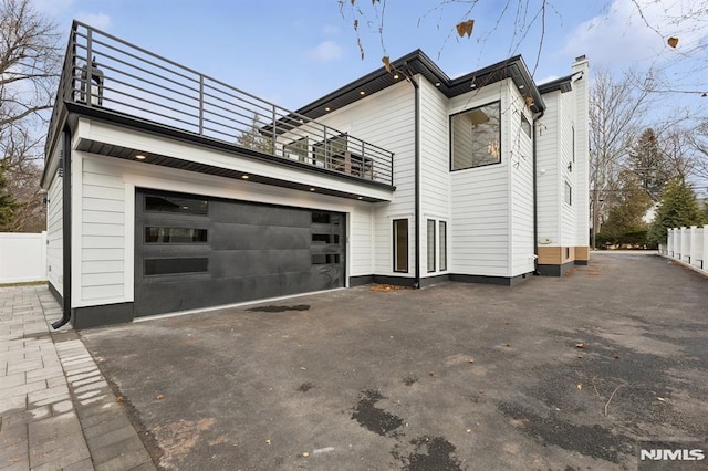 rear view of house with a balcony