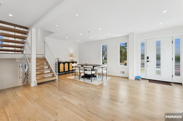 dining area featuring light wood-type flooring