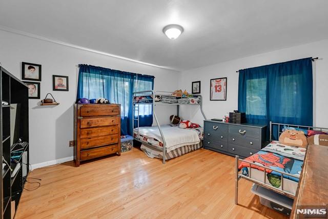 bedroom featuring hardwood / wood-style floors