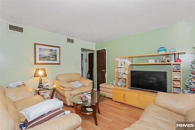 living room with wood-type flooring