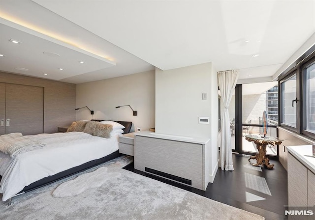 bedroom with wood-type flooring