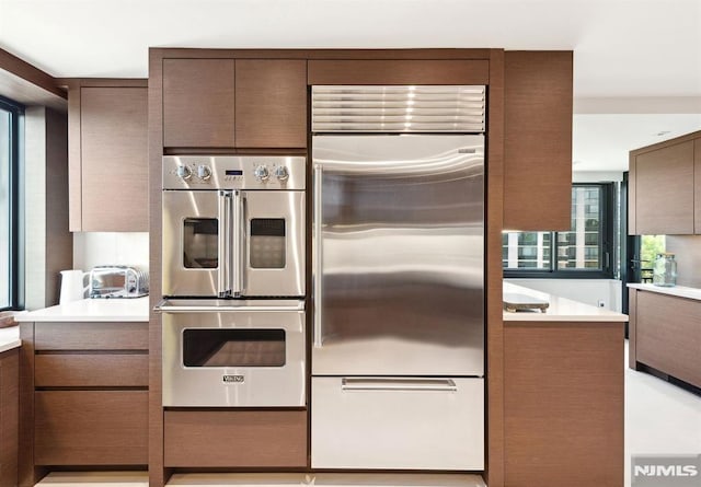 kitchen with kitchen peninsula and stainless steel appliances