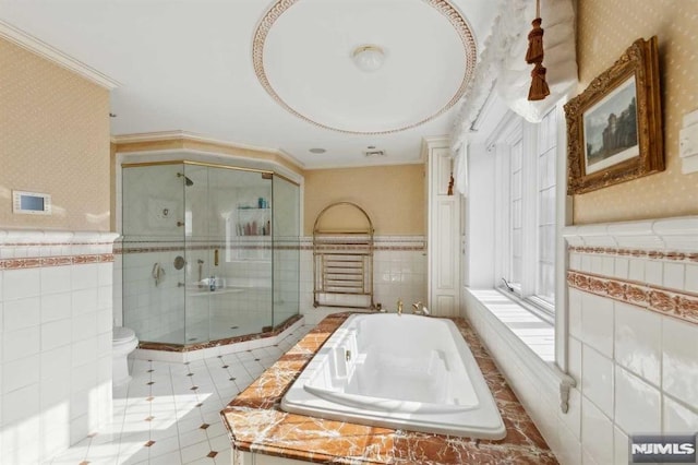 bathroom featuring toilet, tile patterned floors, independent shower and bath, and ornamental molding