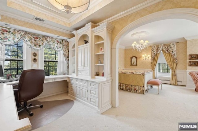 carpeted home office featuring a baseboard heating unit, an inviting chandelier, and crown molding