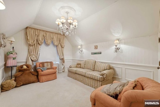 living room featuring carpet, vaulted ceiling, and a notable chandelier