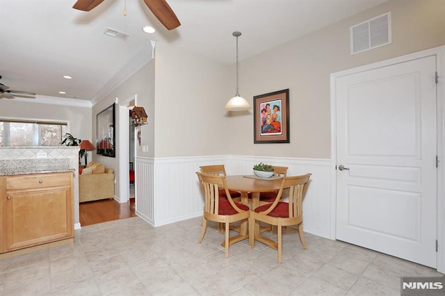 dining room with ornamental molding