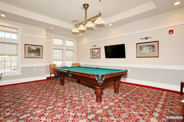 rec room featuring carpet, a tray ceiling, and pool table