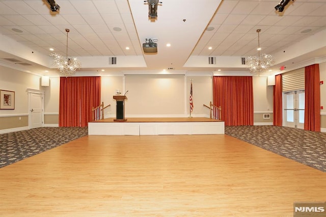 welcome area featuring an inviting chandelier