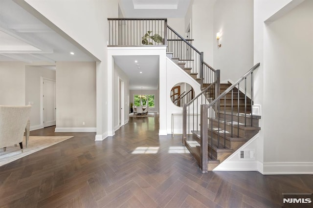 entrance foyer with dark parquet flooring