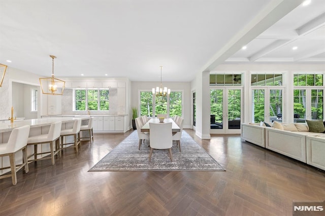 dining room with beamed ceiling, french doors, dark parquet floors, and a notable chandelier