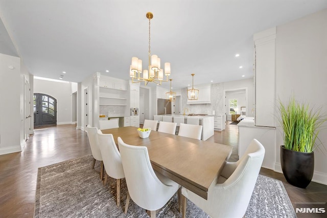 dining room with an inviting chandelier and a wealth of natural light