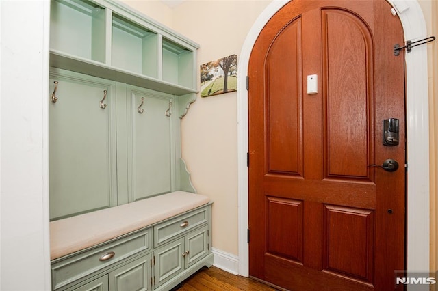 mudroom with dark hardwood / wood-style floors