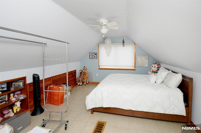 bedroom featuring ceiling fan and lofted ceiling