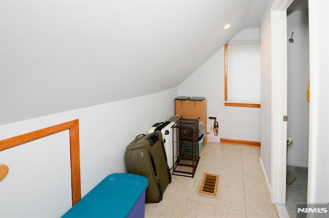 additional living space with lofted ceiling