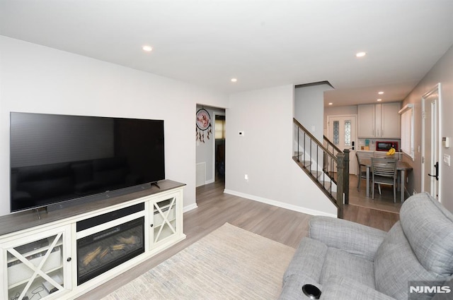 living room featuring light hardwood / wood-style flooring