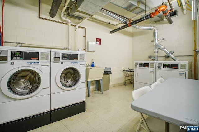 washroom featuring independent washer and dryer