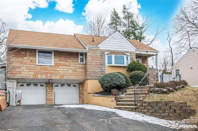 view of front of house with a garage