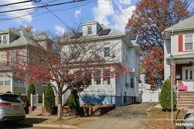 view of front of home with solar panels