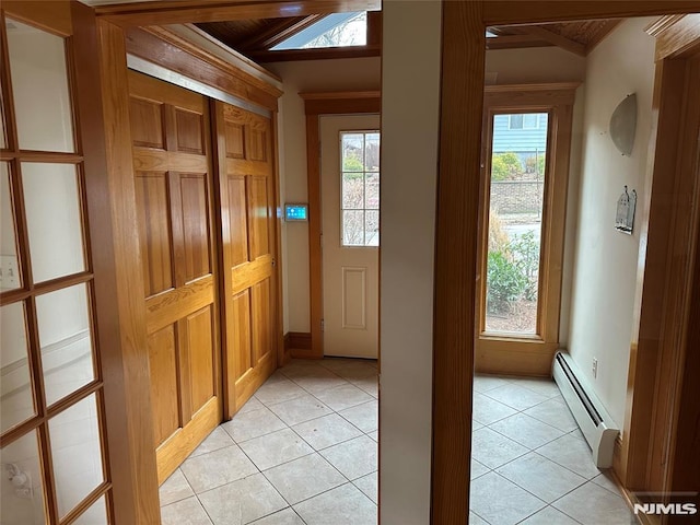 doorway to outside with wood ceiling, vaulted ceiling with beams, a baseboard radiator, and light tile patterned floors