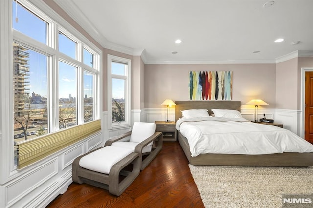 bedroom featuring dark hardwood / wood-style flooring and ornamental molding