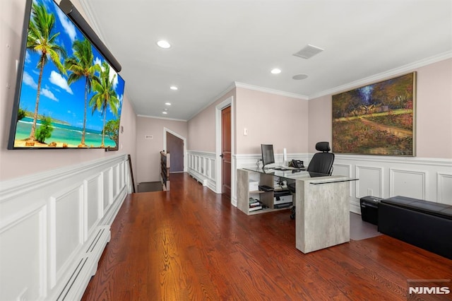 office area with dark hardwood / wood-style flooring, crown molding, and a baseboard heating unit