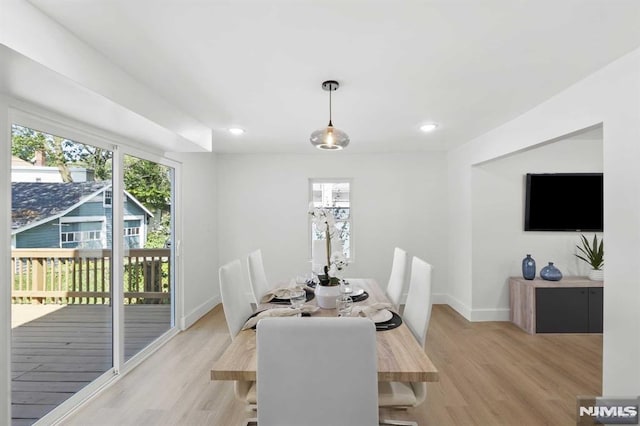 dining space featuring light hardwood / wood-style floors