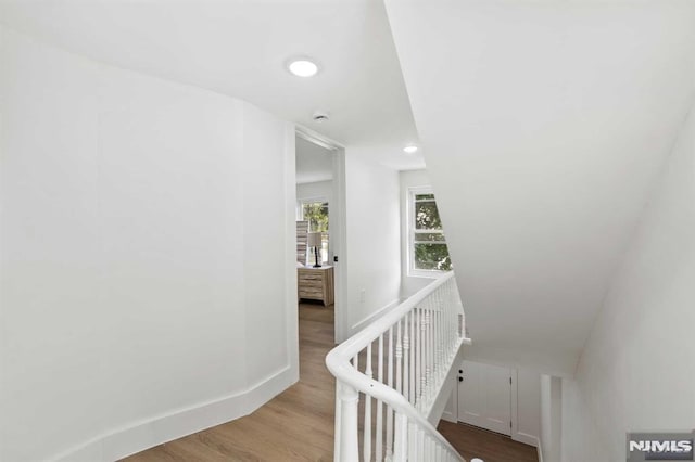 corridor featuring light hardwood / wood-style floors