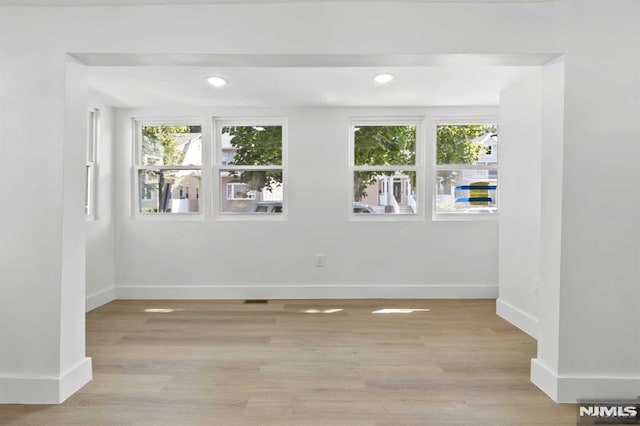 empty room featuring light hardwood / wood-style floors