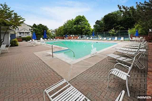 view of pool with a patio