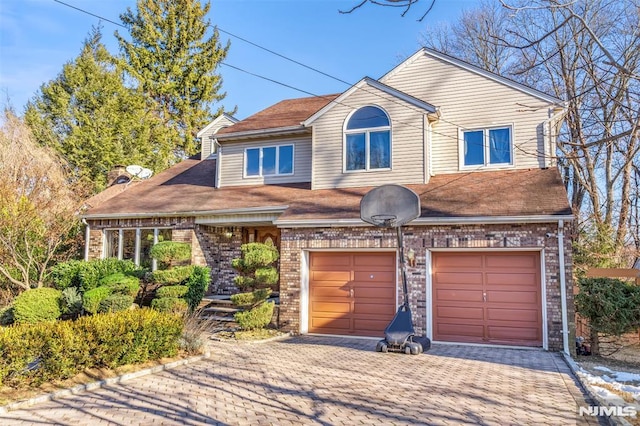 view of front of home with a garage