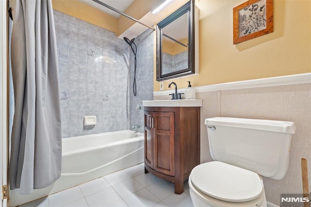 full bathroom with shower / bathtub combination with curtain, tile patterned flooring, vanity, and toilet