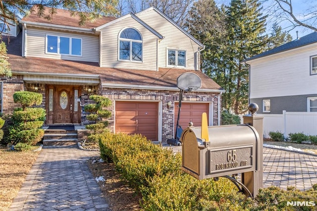 view of front of home with a garage