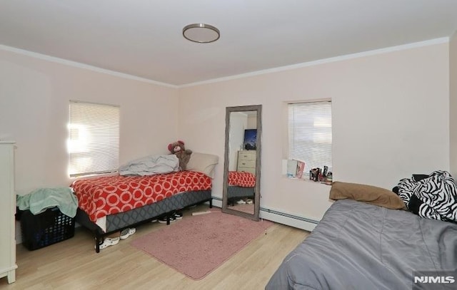 bedroom featuring wood-type flooring, a baseboard radiator, and ornamental molding