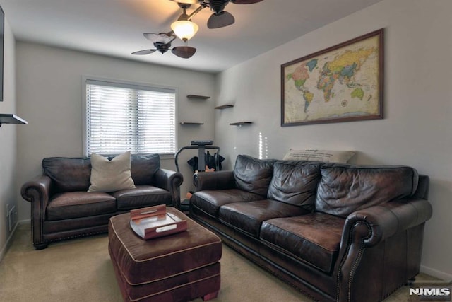 living room featuring ceiling fan and light carpet