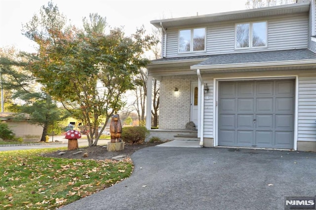 view of property with a garage