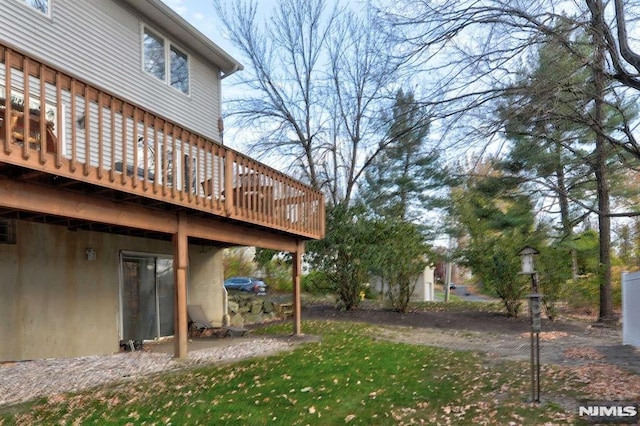 view of yard featuring a deck