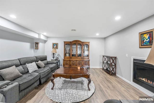 living room featuring light wood-type flooring