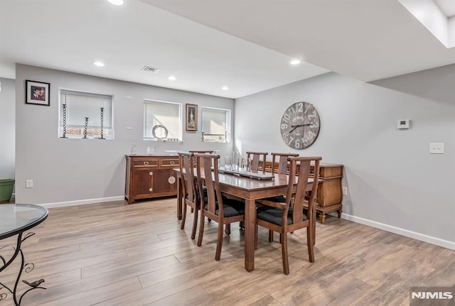 dining room featuring light hardwood / wood-style flooring