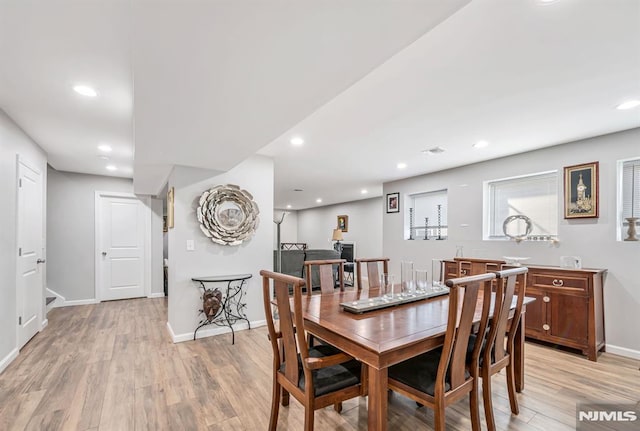 dining area featuring light hardwood / wood-style flooring