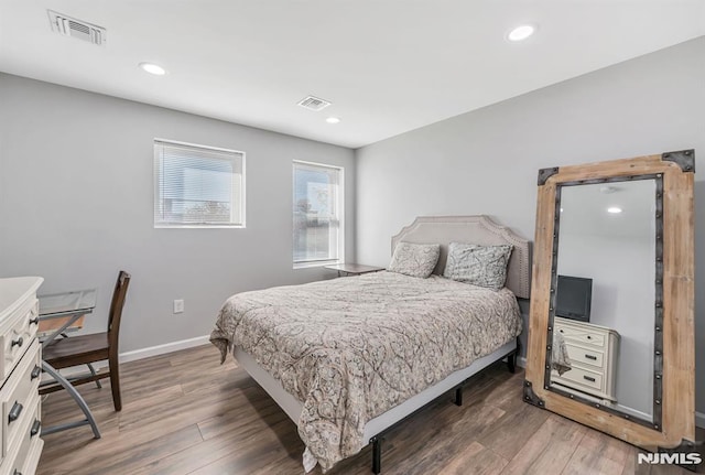 bedroom featuring dark hardwood / wood-style floors