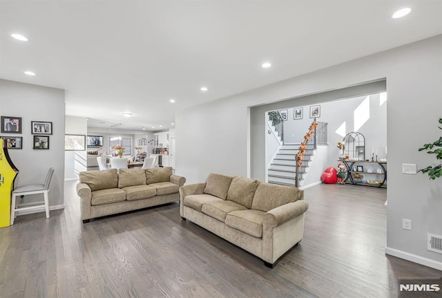 living room with dark wood-type flooring