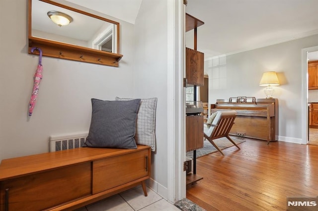 sitting room with light hardwood / wood-style floors