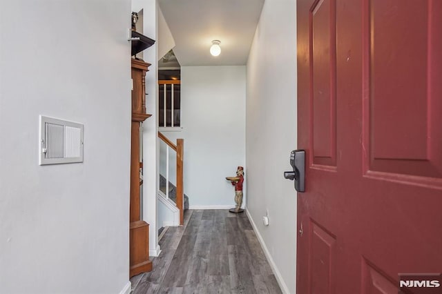 corridor featuring wood-type flooring