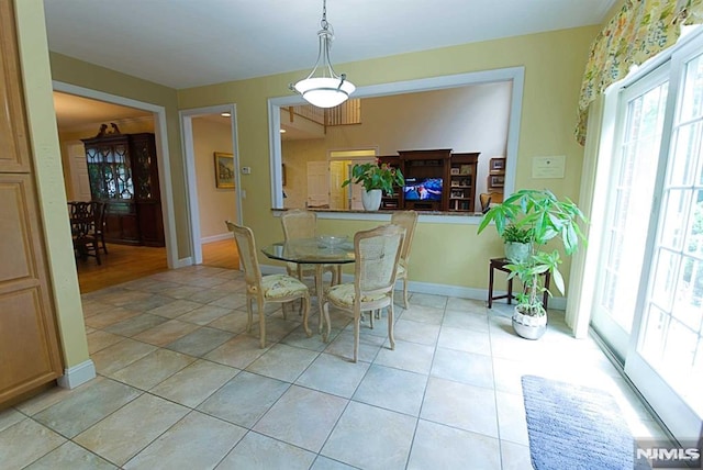 dining room with light tile patterned floors