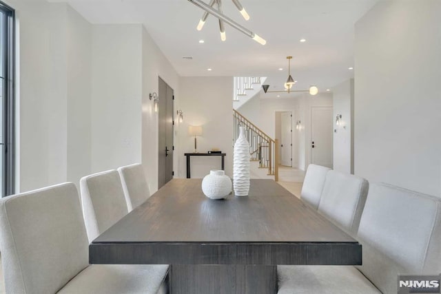 dining room featuring a notable chandelier