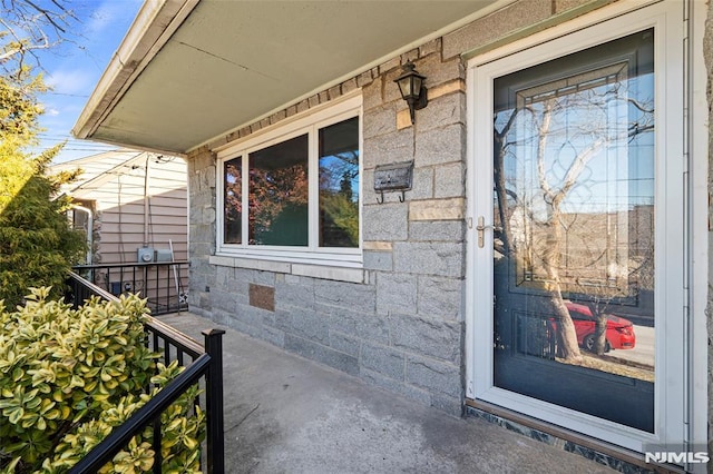 property entrance with a porch