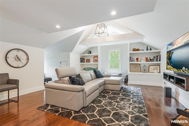 living room with built in shelves, dark hardwood / wood-style flooring, and lofted ceiling