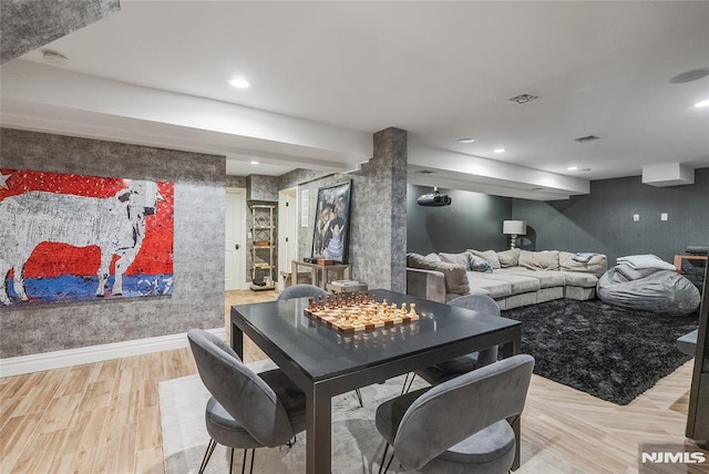 dining room featuring light hardwood / wood-style flooring